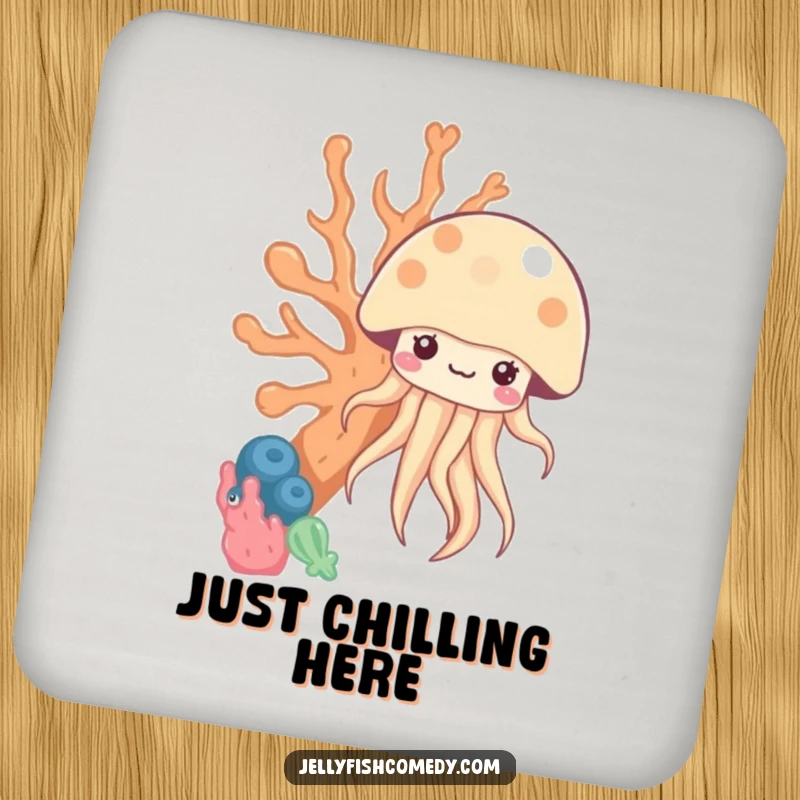 Funny kawaii jellyfish peeking from behind coral on a drink coaster, adding humorous protection to tables.