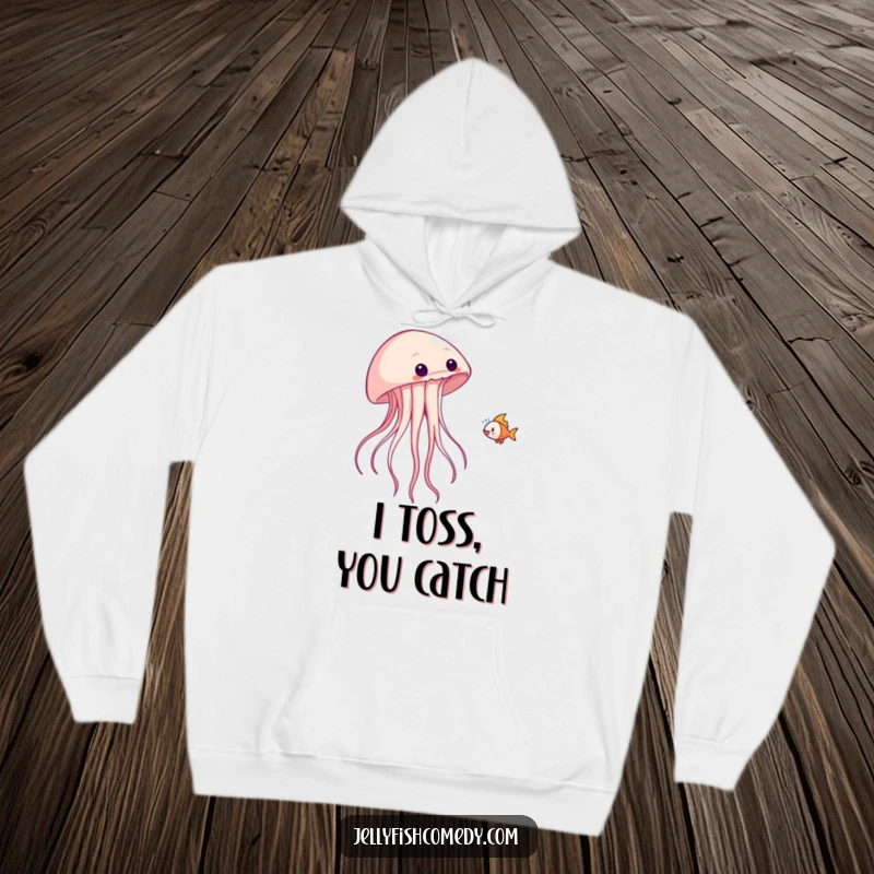 Funny hoodie with a playful jellyfish tossing a fish, perfect for cozy, fun adventures.