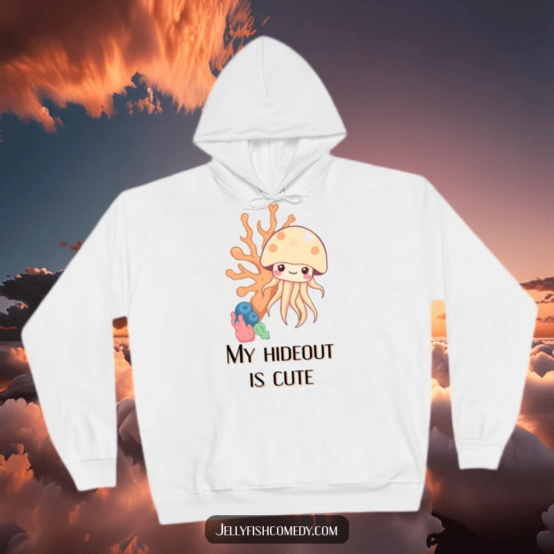 Funny kawaii jellyfish peeking from behind coral on a cozy hoodie, offering warmth and humorous underwater charm.