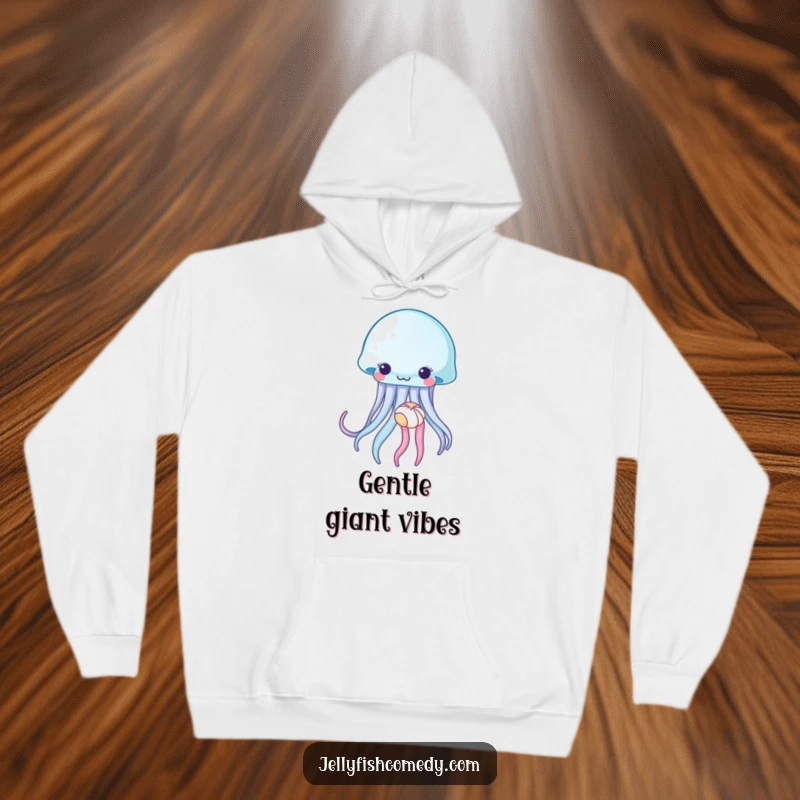 Funny jellyfish hoodie, a sea creature gently holding a tiny seashell with its tentacles, offering warmth and ocean-themed comfort.