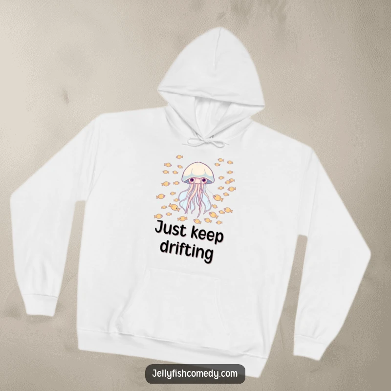 Funny hoodie featuring a happy jellyfish drifting through a school of tiny fish, perfect for cozy, whimsical moments.