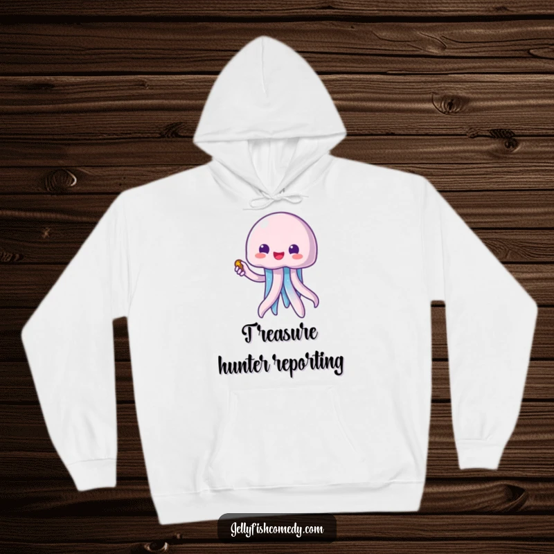 Funny kawaii jellyfish pointing to a treasure chest, featured on a soft and warm hoodie, great for ocean lovers.
