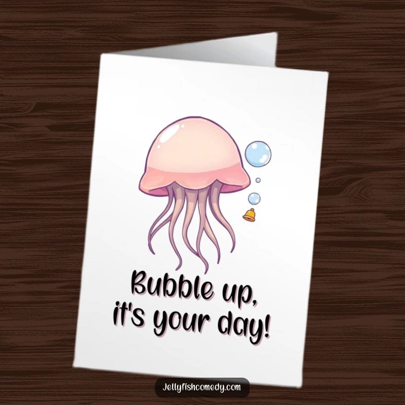 Funny Free Printable Birthday Card: A happy jellyfish playfully bouncing a bubble with its bell, spreading birthday cheer.