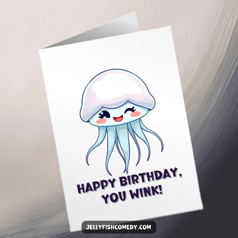 Funny Free Printable Birthday Card: A friendly jellyfish winking while spinning, perfect for a cheerful, downloadable birthday message.