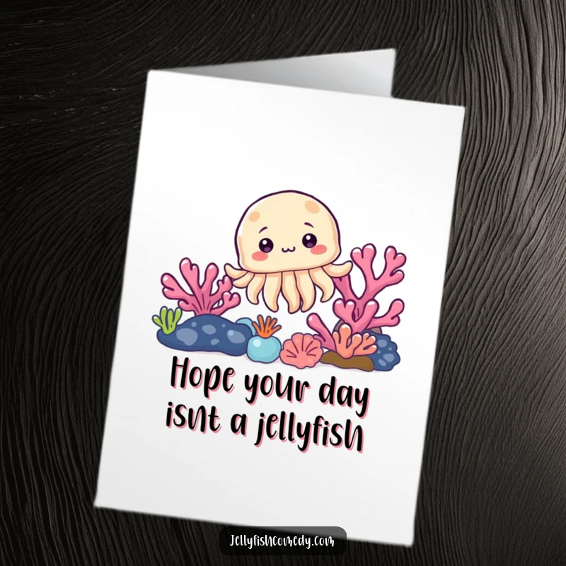 Funny Free Printable Birthday Card: A curious cartoon jellyfish peeks out playfully from behind a vibrant coral reef, wishing a happy birthday.