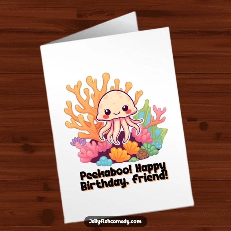 Free Printable Birthday Card: Jellyfish peeking from behind colorful coral, a charming and whimsical downloadable greeting.