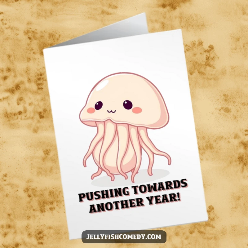 Free Printable Birthday Card: A determined jellyfish straining to push a giant pearl, symbolizing a powerful effort.