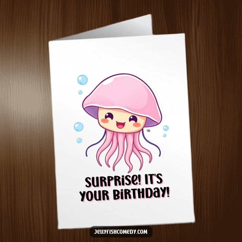 Funny Free Printable Birthday Card of a happy, surprised jellyfish being gently blown by an underwater current, conveying wild birthday wishes.