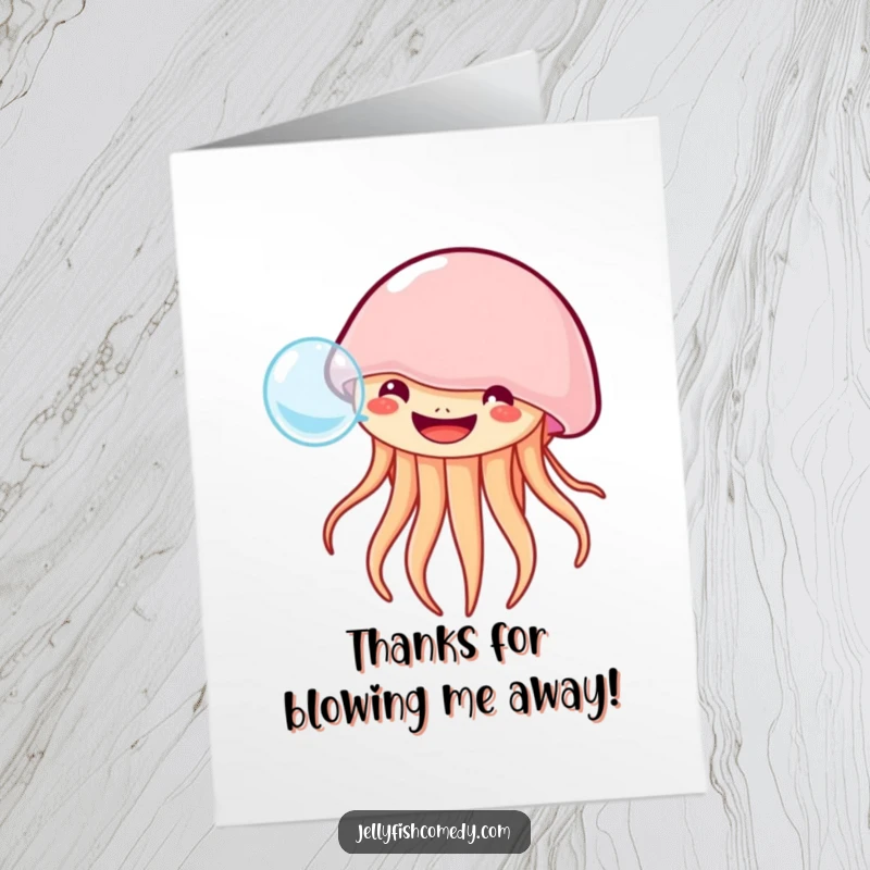 Free printable thank you card featuring a wide-grinning jellyfish blowing a single large bubble, a cheerful way to express thanks.