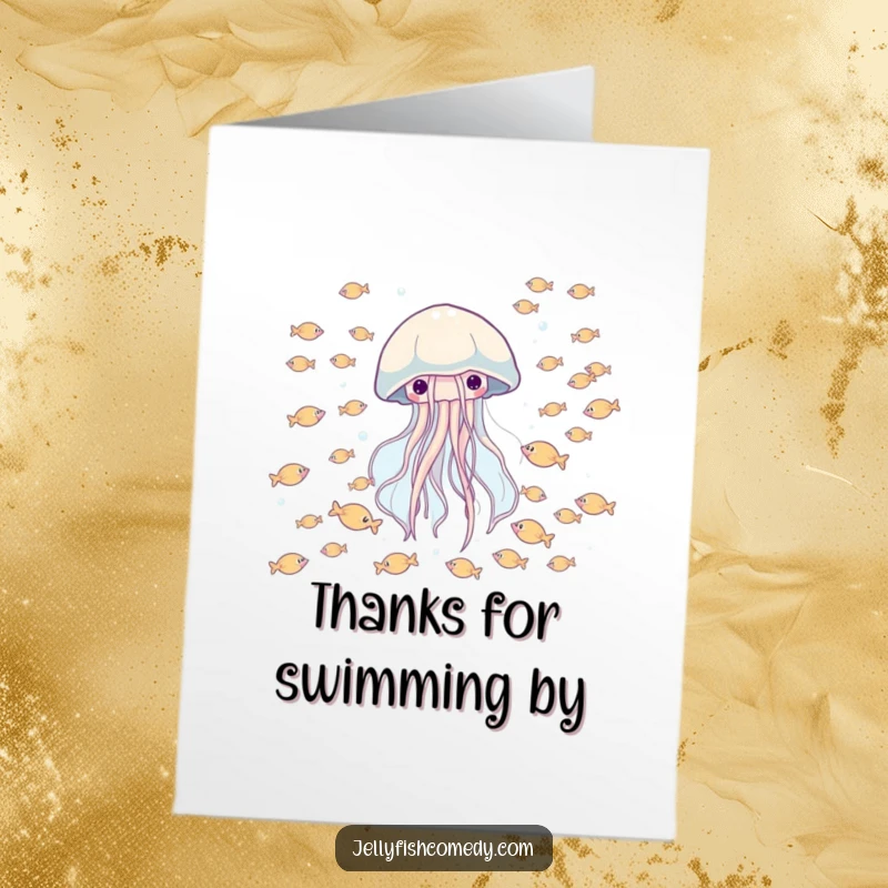 Free Printable Thank You Card showing a happy jellyfish drifting through a school of tiny fish, a charming expression of thanks.