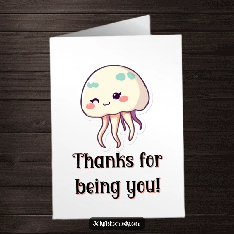 Funny Free Printable Thank You Card featuring a shy jellyfish with a soft smile and waving tentacles, conveying heartfelt thanks.