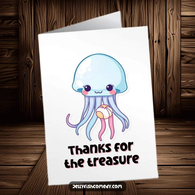 Funny Free Printable Thank You Card: A jellyfish gently holding a tiny seashell, offering a sweet gesture of thanks.