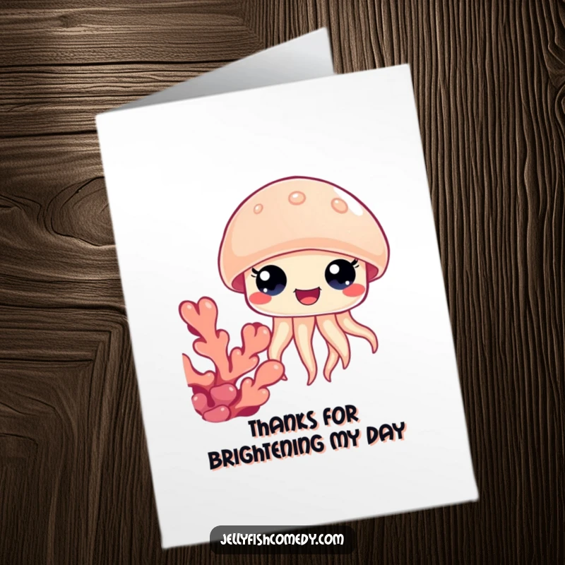 Funny Free Printable Thank You Card: Jellyfish with big happy eyes peeking from behind coral, sharing thanks, a downloadable treasure.