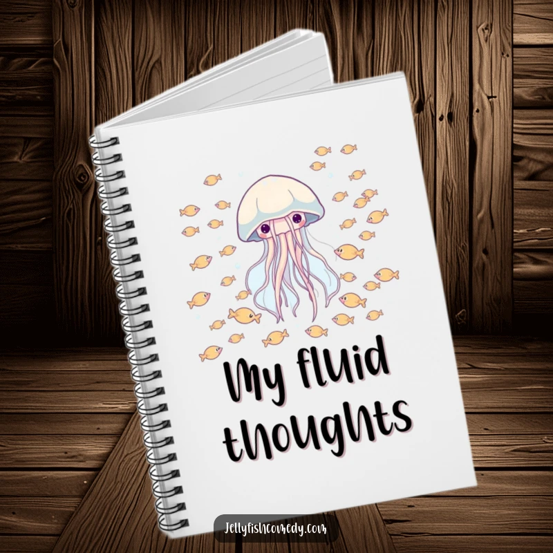 Funny notebook with a happy jellyfish drifting through a school of tiny fish, ideal for journaling and notes.