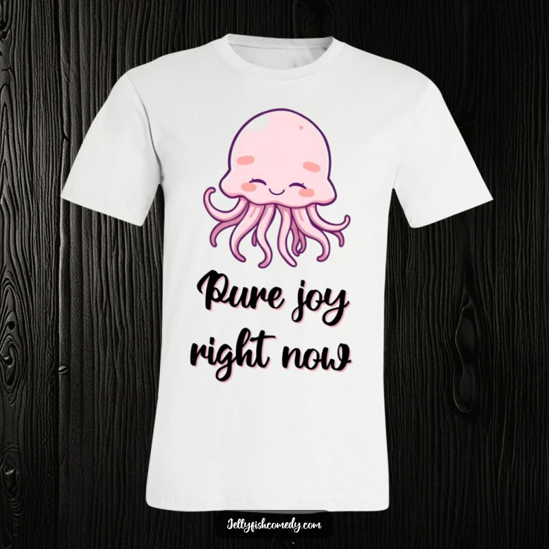 Funny t-shirt showing a delighted jellyfish giggling with closed eyes and playfully wiggling tentacles.