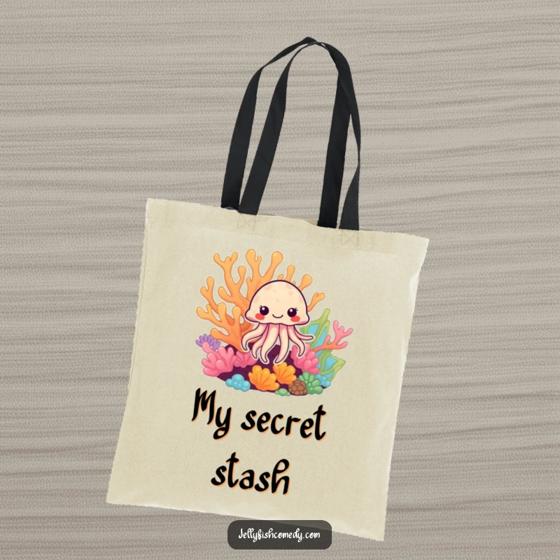 Funny Jellyfish Tote Bag: A cute jellyfish peeks from behind colorful coral, a humorous and stylish accessory.