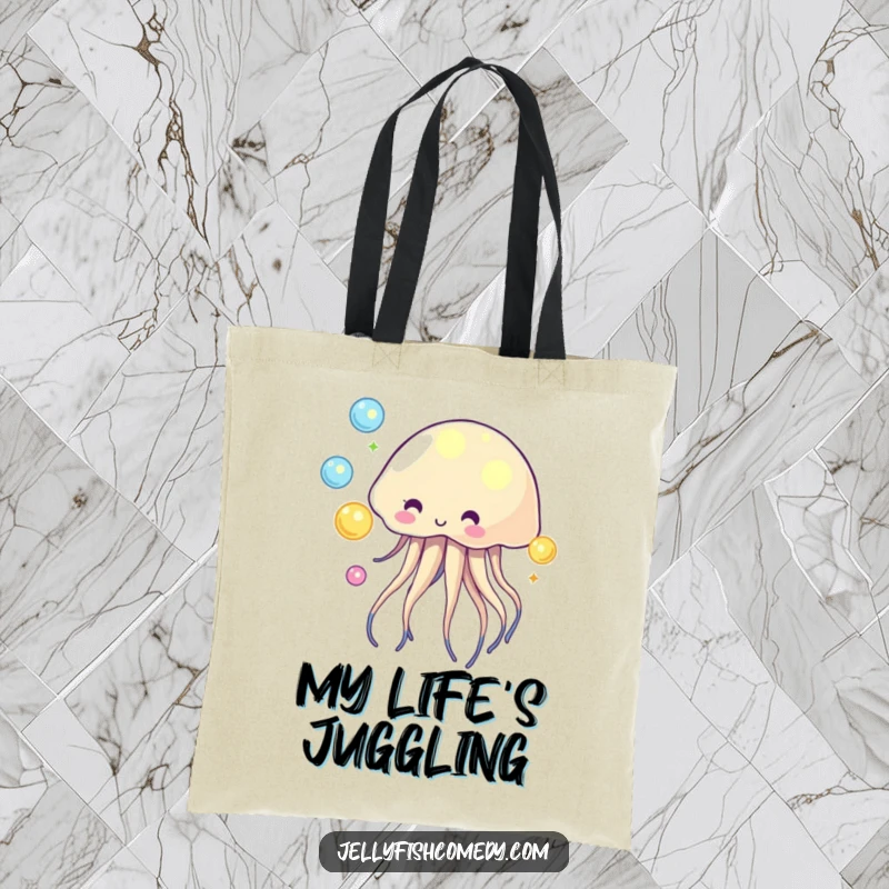 Funny tote bag featuring a skilled jellyfish juggling bright glowing orbs, perfect for magical transport.